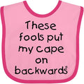 inktastic These Fools Put My Cape on Backwards Baby Bib by Inktastic