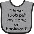 inktastic These Fools Put My Cape on Backwards Baby Bib by Inktastic